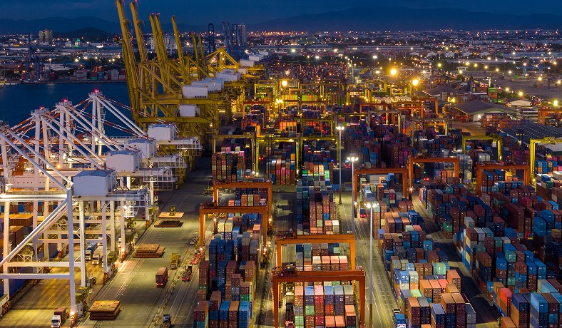 crane-loading-cargo-container-from-truck-to-container